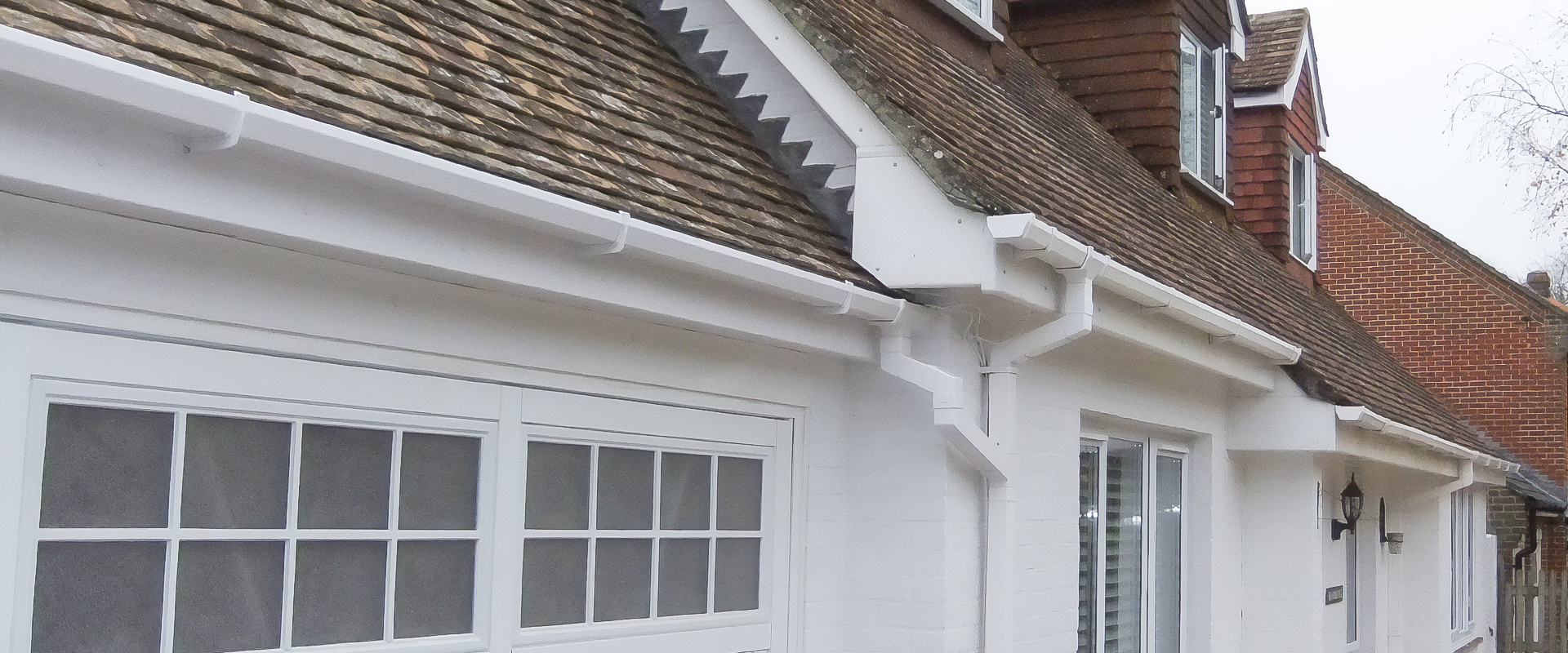 Image of Guttering & Downpipe Completed by Newbury Roofing. Domestic & Commercial Roofing Contractor.